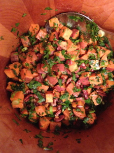 The tastiest sweet potatoes, with lemon maple dressing, parsley, cilantro, raisins and pecans